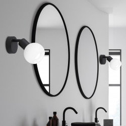 aplique de pared Opal Negro es una luminaria elegante y moderna que aporta un toque de sofisticación a cualquier espacio